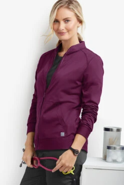 UA Butter-Soft STRETCH Women's 2-Pocket Technical Knit Zip Front Scrub Jacket 3 UA Butter-Soft STRETCH Women's 2-Pocket Technical Knit Zip Front Scrub Jacket -Cherokee Shop KN482 WINE 6 S