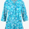 Butter-Soft Dazzling Snowflakes Turquoise Women's 2-Pocket Round Neckline Print Scrub Top